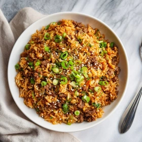 Step-by-step preparation of Beef Fried Rice showing ingredients and initial cooking steps